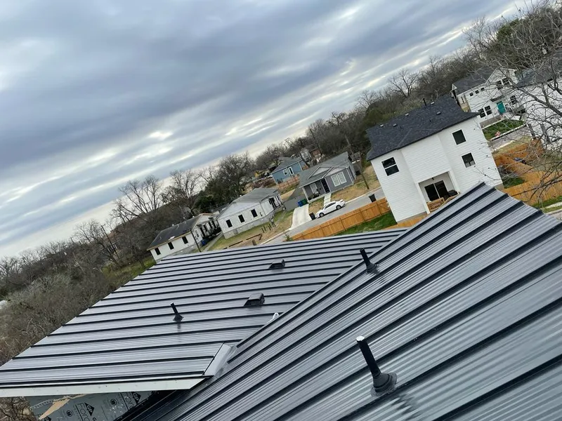Standing seam metal roof panels with vents for Skylight Repair in Midland